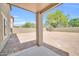 View of the private backyard with desert landscaping, perfect for outdoor living and entertaining at 25726 W Burgess Ln, Buckeye, AZ 85326