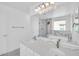 Bathroom features double sinks, quartz countertop, and a large vanity mirror at 25726 W Burgess Ln, Buckeye, AZ 85326