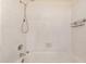 Shower and tub with tiled walls, chrome fixtures, and a shower head at 2625 E Indian School Rd # 143, Phoenix, AZ 85016