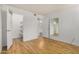 Bedroom with vinyl floors, closet, and access to the bathroom at 2625 E Indian School Rd # 143, Phoenix, AZ 85016