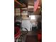 Functional laundry area with washer and dryer; bike, shelf storage, and an American flag at 303 S Recker Rd # 78, Mesa, AZ 85206
