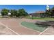 Outdoor basketball court with well-maintained surface and hoops for recreational sports at 3037 E Hobart St, Gilbert, AZ 85296