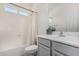 Bright bathroom with a vanity, sink, toilet, and bathtub with shower, perfect for everyday use at 3037 E Hobart St, Gilbert, AZ 85296