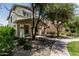 Charming two-story home with covered porch and landscaped front yard at 3037 E Hobart St, Gilbert, AZ 85296