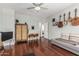Open concept living room with hardwood floors, modern furnishings, and stylish décor at 3037 E Hobart St, Gilbert, AZ 85296