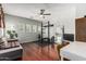 Spacious living room featuring hardwood floors, ample natural light, and a modern ceiling fan at 3037 E Hobart St, Gilbert, AZ 85296