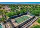 Aerial view of a tennis court showcasing its well-maintained surface and surrounding community at 3037 E Hobart St, Gilbert, AZ 85296