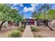 Charming apartment complex featuring well-maintained landscaping and inviting walkways at 310 W Earll Dr # 102, Phoenix, AZ 85013