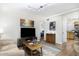 Inviting living area flows seamlessly into the kitchen, creating an open and airy atmosphere at 310 W Earll Dr # 102, Phoenix, AZ 85013