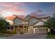 Inviting two-story home with a three-car garage and covered front porch at 3133 E Silo Dr, Gilbert, AZ 85296