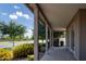 Spacious covered front porch with brick flooring, sturdy support columns, and garden views at 3133 E Silo Dr, Gilbert, AZ 85296