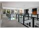 Spacious upstairs hallway with glass railings and views of the lower level at 3133 E Silo Dr, Gilbert, AZ 85296