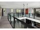 Open hallway offering views of downstairs living area and kitchen at 3133 E Silo Dr, Gilbert, AZ 85296