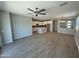 Spacious living room featuring hardwood floors, recessed lighting, and an open layout perfect for entertaining at 3375 W Verde River Rd, San Tan Valley, AZ 85144