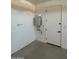 Functional utility room featuring a water heater, offering practicality at 3375 W Verde River Rd, San Tan Valley, AZ 85144