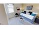 Well-lit bedroom with a daybed, stylish pillows, and decorative elements, offering a relaxing retreat at 35068 N Sacramento Wash Rd, San Tan Valley, AZ 85144
