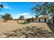 Expansive backyard featuring gravel landscaping and a small patch of grass at 3614 W Danbury Dr, Glendale, AZ 85308