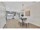 Open concept dining room adjacent to a bright, updated kitchen at 3614 W Danbury Dr, Glendale, AZ 85308