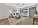 Cozy living area featuring neutral tones, wood-look flooring, and lots of natural light at 3614 W Danbury Dr, Glendale, AZ 85308