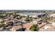 A well-maintained home featuring desert landscaping, mature trees and lawns, and city views at 3713 W Nancy Ln, Phoenix, AZ 85041