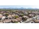 A well-maintained home featuring desert landscaping, a tile roof, and mountain views at 3713 W Nancy Ln, Phoenix, AZ 85041