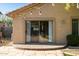 Private backyard with patio, desert landscaping, and string lights, excellent for relaxation and outdoor living at 3713 W Nancy Ln, Phoenix, AZ 85041