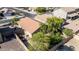 The backyard has privacy fencing, mature trees, and drought-resistant landscaping at 3713 W Nancy Ln, Phoenix, AZ 85041