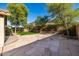 Spacious backyard with a combination of stone patio and lush green lawn, perfect for outdoor living at 3713 W Nancy Ln, Phoenix, AZ 85041