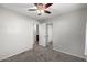 Bedroom with a ceiling fan, and closets with mirrored doors at 3713 W Nancy Ln, Phoenix, AZ 85041