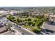 Aerial view showcases a community park with lush green space and playground equipment at 3713 W Nancy Ln, Phoenix, AZ 85041