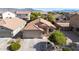 A well-maintained home featuring a desert landscaped front yard and a two car garage at 3713 W Nancy Ln, Phoenix, AZ 85041