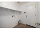 Laundry room with shelf and tile flooring at 3713 W Nancy Ln, Phoenix, AZ 85041