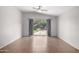 Spacious living area with tile floors and sliding glass doors to the backyard patio at 3713 W Nancy Ln, Phoenix, AZ 85041
