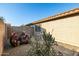 Low-maintenance side yard featuring desert landscaping, gravel, cacti, and a privacy wall for a tidy look at 3713 W Nancy Ln, Phoenix, AZ 85041