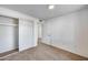 Comfortable bedroom with a large closet and view into the hall at 3801 E Captain Dreyfus Ave, Phoenix, AZ 85032