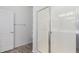 Bathroom features a glass enclosed shower, white cabinets and neutral walls at 40066 W Jenna Ln, Maricopa, AZ 85138