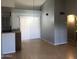 Cozy dining area boasts vaulted ceilings, hardwood floors, and sliding glass door for natural light at 4042 E Carson Rd, Phoenix, AZ 85042