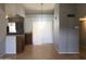 Cozy dining space showcasing hardwood floors and an open design connected to the kitchen at 4042 E Carson Rd, Phoenix, AZ 85042