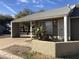 Charming home with a covered front porch and desert landscaping at 4042 E Carson Rd, Phoenix, AZ 85042