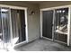 Spacious covered patio with sliding door access to the home at 4042 E Carson Rd, Phoenix, AZ 85042