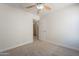 Cozy bedroom with a ceiling fan, perfect for relaxation and rest at 41767 W Somerset Dr, Maricopa, AZ 85138