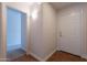 Bright foyer with tile flooring and an open doorway to the living spaces at 41767 W Somerset Dr, Maricopa, AZ 85138