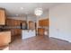 Large kitchen featuring an island, stainless appliances, and built-in desk space with abundant cabinets at 41767 W Somerset Dr, Maricopa, AZ 85138