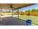 A covered patio and a backyard with a pool and putting green at 4307 E Shetland Dr, San Tan Valley, AZ 85140