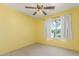 Bedroom with ceiling fan and view of the neighborhood at 4307 E Shetland Dr, San Tan Valley, AZ 85140