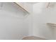 Walk-in closet with white walls and rod and shelf organization at 4307 E Shetland Dr, San Tan Valley, AZ 85140