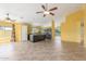 Open-concept kitchen with an island, a ceiling fan, and tile floors at 4307 E Shetland Dr, San Tan Valley, AZ 85140