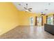 Spacious living room with tile floors, neutral walls, and ceiling fans at 4307 E Shetland Dr, San Tan Valley, AZ 85140