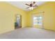 Bedroom with a view of the pool, natural lighting, and ensuite bath at 4307 E Shetland Dr, San Tan Valley, AZ 85140