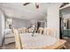 Bright dining area with a wooden table, seating for six, and adjacent living space at 506 S 81St Pl, Mesa, AZ 85208